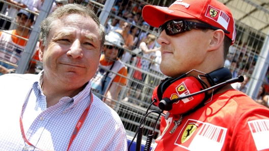 epa03421163 (FILE) A file picture dated 24 August 2008 shows German Formula One driver Michael Schumacher (R) and French Jean Todt (L), Chief Executive Offocer of Scuderia Ferrari before the Grand Prix of Europe at Valencia Street Circuit in Valencia, Spain. Seven-time world champion Formula One driver Michael Schumacher on 04 October 2012 announced his retirement form the sport. The statement ended all speculation that 43-year-old Schumacher may find a new team after Mercedes said it would not renew his contract at the end of the season.  EPA/FELIX HEYDER