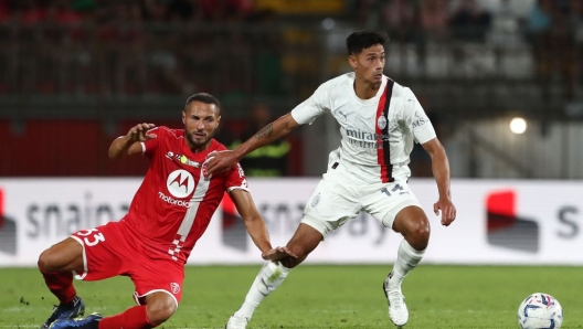 MONZA, ITALY - AUGUST 08: Tijjani Reijnders of AC Milan competes for the ball with Danilo D’Ambrosio of AC Monza during the Trofeo Silvio Berlusconi between AC Monza and AC Milan at U-Power Stadium on August 08, 2023 in Monza, Italy. (Photo by Marco Luzzani/Getty Images)