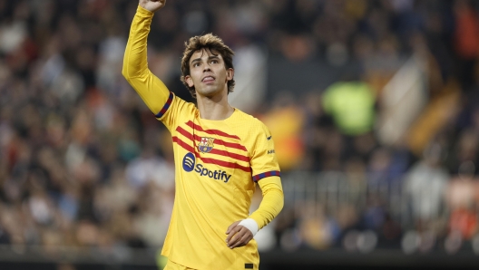 epa11033179 FC Barcelona's Joao Felix celebrates after scoring the 0-1 goal during the Spanish LaLiga soccer match between Valencia FC and FC Barcelona, in Valencia, Spain, 16 December 2023.  EPA/Kai Foersterling