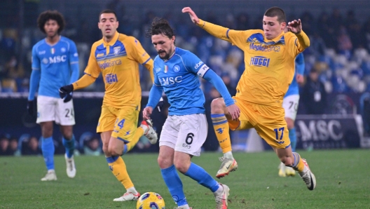 Napoli?s defender Mario Rui (L) and  Frosinone?s forward Giorgi Kvernadze    in action during the match valid for the round of 16 of the Coppa Italia between  Ssc Napoli  and Frosinone Calcio   at ' Diego Armando Maradona' stadiun in Naples, Italy, 19 december   2023 ANSA / CIRO FUSCO