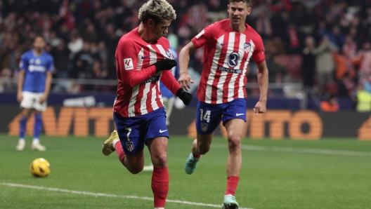 Atletico Madrid's French forward #07 Antoine Griezmann celebrates after scoring his team's first goal during the Spanish league football match between Club Atletico de Madrid and Getafe CF at the Metropolitano stadium in Madrid on December 19, 2023. (Photo by Thomas COEX / AFP)