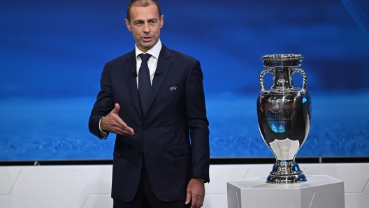 UEFA president Aleksander Ceferin gestures as he announces the names of UK and Ireland being elected to host the Euro 2028 fooball tournament during the announcement ceremony at the UEFA headquarters in Nyon on October 10, 2023. (Photo by Fabrice COFFRINI / AFP)