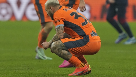 Inter Milan's Federico Dimarco at the end of the Italian Cup round of 16 soccer match between Inter Milan and Bologna, at the San Siro stadium in Milan, Italy, Wednesday, Dec. 20, 2023. (AP Photo/Luca Bruno)