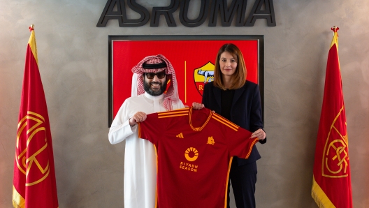 ROME, ITALY - OCTOBER 04: AS Roma CEO Lina Souloukou and His Excellency Turki Alalshikh, Chairman of Saudi Arabia?s General Entertainment Authority pose with the AS Roma jersey featuring the Riyadh Season logo at Centro Sportivo Fulvio Bernardini on October 04, 2023 in Rome, Italy. (Photo by Fabio Rossi/AS Roma via Getty Images)