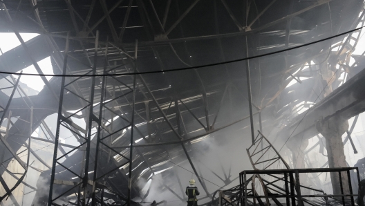 epaselect epa11047957 Ukrainian rescuers work at the site of a rocket attack on a civilian warehouse in Kyiv (Kiev), Ukraine, 29 December 2023, amid the Russian invasion. At least 16 people have died and dozens more injured after Russia launched a wave of airstrikes across Ukraine, Ukrainian authorities said on 29 December. Strikes were reported in Kyiv, Lviv, Odesa, Dnipro, Kharkiv, Zaporizhzhia, and other Ukrainian cities. Russia launched 'more than 150 missiles and combat drones' at Ukrainian cities, Ukraine's Prosecutor General Andriy Kostin said in a statement, adding that extensive damage included residential buildings, educational institutions and hospitals. Russian troops entered Ukraine on 24 February 2022 starting a conflict that has provoked destruction and a humanitarian crisis.  EPA/OLEG PETRASYUK