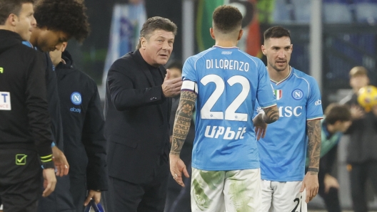 Napoli's head coach Walter Mazzarri (L), Napoli's Giovanni Di Lorenzo during the Italian Serie A soccer match between AS Roma and SSC Napoli at the Olimpico stadium in Rome, Italy, 23 December 2023. ANSA/FABIO FRUSTACI