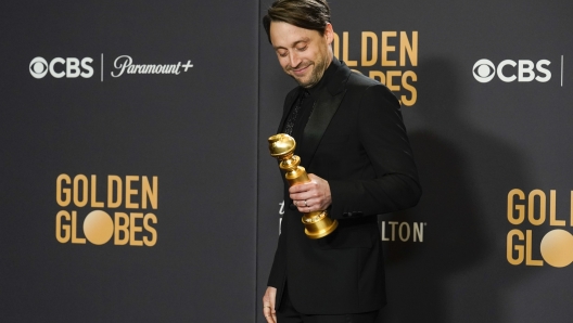 Kieran Culkin poses in the press room with the award for best performance by an actor in a television series, drama for "Succession" at the 81st Golden Globe Awards on Sunday, Jan. 7, 2024, at the Beverly Hilton in Beverly Hills, Calif. (AP Photo/Chris Pizzello)