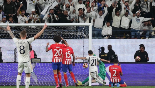 Real Madrid's Spanish forward #21 Brahim Diaz and Real Madrid's German midfielder #08 Toni Kroos celebrate their team's fourth goal during the Spanish Super Cup semi-final football match between Real Madrid and Atletico Madrid at the Al-Awwal Park Stadium in Riyadh, on January 10, 2024. (Photo by Giuseppe CACACE / AFP)