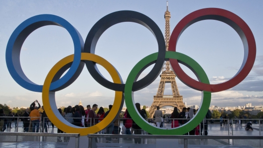 FILE - Olympic rings are set up at Trocadero plaza that overlooks the Eiffel Tower, a day after the official announcement that the 2024 Summer Olympic Games will be in the French capital, in Paris, France, Thursday, Sept. 14, 2017. The WNBA released its schedule on Monday, Dec. 18, 2023, with its usual month-long break for the Olympics. There will be no regular season contests from July 18-Aug. 14 because of the Paris Games. (AP Photo/Michel Euler, File)