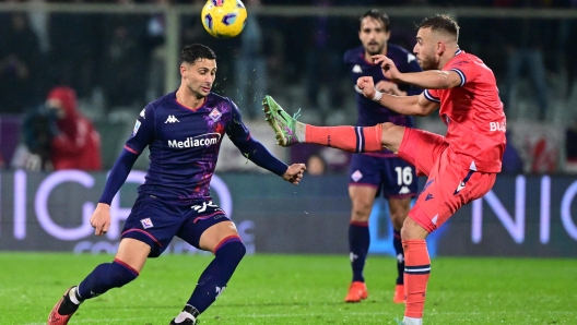 Fiorentina's Midfielder Rolando Mandragora (L) in action against Udinese's midfielder Sandi Lovri? (R) during Serie A soccer match ACF Fiorentina vs Udinese Calcio at Artemio Franchi Stadium in Florence, Italy, 14 January  2024 ANSA/CLAUDIO GIOVANNINI