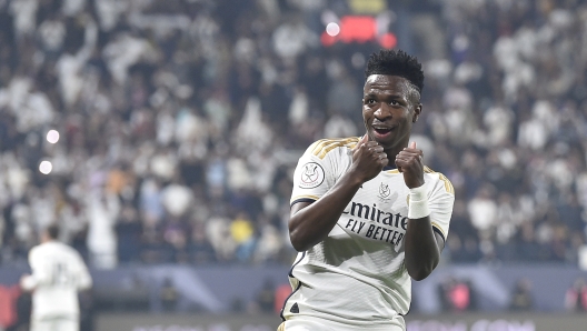 Real Madrid's Vinicius Junior celebrates after scoring at Barcelona during the Spanish Super Cup final soccer match between Real Madrid and Barcelona at Al Awwal Park Stadium in Riyadh, Saudi Arabia, Sunday, Jan. 14, 2024. (AP Photo)