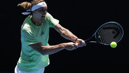 epa11070589 Alexander Zverev of Germany in action during a practice session ahead of the Australian Open 2024, at Melbourne Park in Melbourne, Australia, 12 January 2024.  EPA/MAST IRHAM