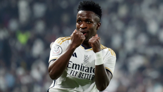 RIYADH, SAUDI ARABIA - JANUARY 14: Vinicius Junior of Real Madrid celebrates after scoring their team's first goal during the Super Copa de España Final match between Real Madrid and FC Barcelona on January 14, 2024 in Riyadh, Saudi Arabia. (Photo by Yasser Bakhsh/Getty Images)