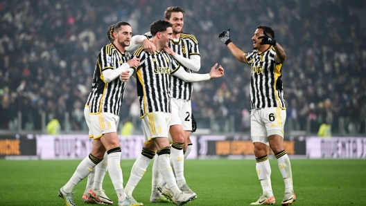 TURIN, ITALY - JANUARY 16: Dusan Vlahovic of Juventus celebrates after scoring his team's second goal with teammates Adrien Rabiot, Daniele Rugani and Danilo during the Serie A TIM match between Juventus and US Sassuolo - Serie A TIM at Allianz Stadium on January 16, 2024 in Turin, Italy. (Photo by Daniele Badolato - Juventus FC/Juventus FC via Getty Images)