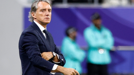 Saudi Arabia's Italian coach Roberto Mancini looks on during the Qatar 2023 AFC Asian Cup Group F football match between Saudi Arabia and Oman at the Khalifa International Stadium in Doha on January 16, 2024. (Photo by KARIM JAAFAR / AFP)