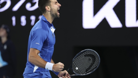 Novak Djokovic of Serbia celebrates after defeating Alexei Popyrin of Australia in their second round match at the Australian Open tennis championships at Melbourne Park, Melbourne, Australia, Wednesday, Jan. 17, 2024. (AP Photo/Asanka Brendon Ratnayake)