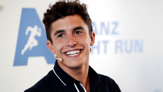 epa07744939 Spanish MotoGP rider Marc Marquez, seven-time world champion, smiles during an interview at the Barcelona-Catalonia Racetrack, in Barcelona, Catalonia, Spain, 27 July 2019. The Marquez brothers will participate in the third charity race Alliance Night Run.  EPA/Alejandro Garcia