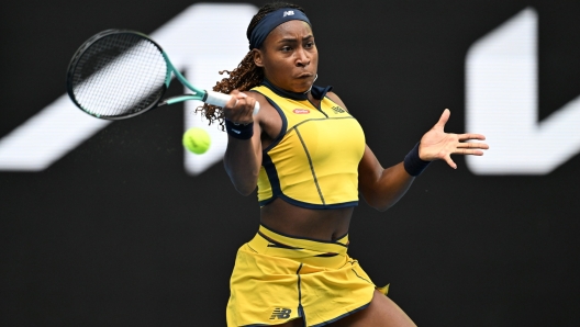 epa11093093 Coco Gauff of the USA in action during her 4th round match against Magdalena Frech of Poland on Day 8 of the 2024 Australian Open at Melbourne Park in Melbourne, Australia, 21 January 2024.  EPA/LUKAS COCH AUSTRALIA AND NEW ZEALAND OUT