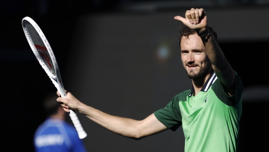 epa11095461 Daniil Medvedev of Russia celebrates after defeating Nuno Borges of Portugal during the men's fourth round match at the Australian Open tennis tournament in Melbourne, Australia, 22 January 2024.  EPA/MAST IRHAM