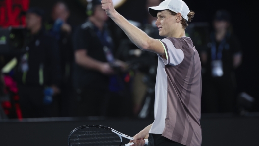 Jannik Sinner celebrates after defeating Andrey Rublev of Russia following their quarterfinal match at the Australian Open tennis championships at Melbourne Park, Melbourne, Australia, Wednesday, Jan. 24, 2024. (AP Photo/Asanka Brendon Ratnayake)