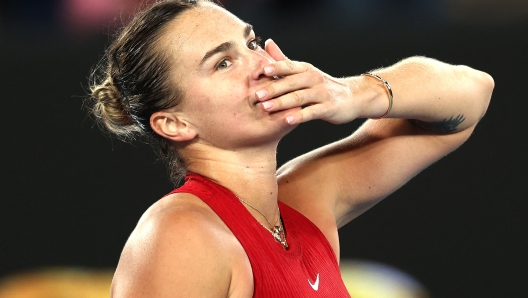 Belarus' Aryna Sabalenka celebrates victory against USA's Coco Gauff during their women's singles semi-final match on day 12 of the Australian Open tennis tournament in Melbourne on January 25, 2024. (Photo by Martin KEEP / AFP) / -- IMAGE RESTRICTED TO EDITORIAL USE - STRICTLY NO COMMERCIAL USE --