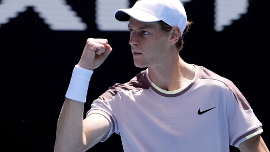 Jannik Sinner of Italy reacts during his semifinal against Novak Djokovic of Serbia at the Australian Open tennis championships at Melbourne Park, Melbourne, Australia, Friday, Jan. 26, 2024. (AP Photo/Andy Wong)