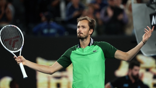 TOPSHOT - Russia's Daniil Medvedev celebrates victory against Germany's Alexander Zverev during their men's singles semi-final match on day 13 of the Australian Open tennis tournament in Melbourne on January 27, 2024. (Photo by Martin KEEP / AFP) / -- IMAGE RESTRICTED TO EDITORIAL USE - STRICTLY NO COMMERCIAL USE --