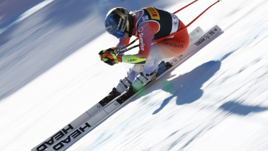 Switzerland's Lara Gut Behrami speeds down the course during an alpine ski, women's World Cup super G race, in Cortina d'Ampezzo, Italy, Sunday, Jan. 28, 2024. (AP Photo/Gabriele Facciotti)