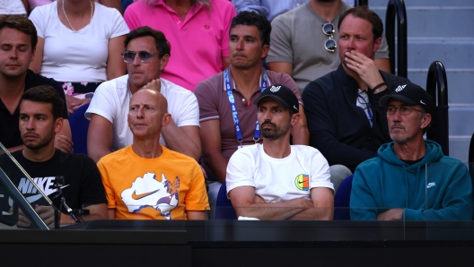 MELBOURNE, AUSTRALIA - JANUARY 28: Simone Vagnozzi and Darren Cahill, coach of Jannik Sinner look on during the Men's Singles Final match between Jannik Sinner of Italy and Daniil Medvedev during the 2024 Australian Open at Melbourne Park on January 28, 2024 in Melbourne, Australia. (Photo by Graham Denholm/Getty Images)