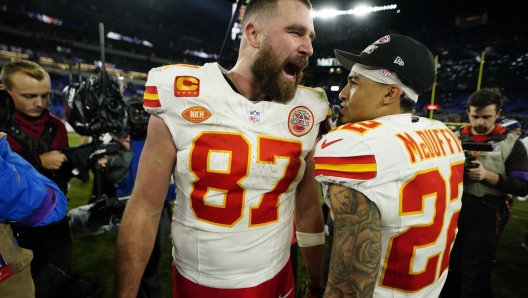 epa11111806 Kansas City Chiefs tight end Travis Kelce (C) celebrates with Kansas City Chiefs cornerback Trent McDuffie (R) after defeating the Baltimore Ravens during the AFC conference championship game between the Baltimore Ravens and the Kansas City Chiefs in Baltimore, Maryland, USA, 28 January 2024. The AFC conference championship Kansas City Chiefs will face the winner of the NFC conference championship game between the San Francisco 49ers and the Detroit Lions to advance to the Super Bowl LVIII in Las Vegas, Nevada, on 11 February 2024.  EPA/SHAWN THEW