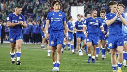 ItalyÂ?s Ange Capuozzo (C) reacts with his teammates after defeat during the Six Nations Rugby match Italy vs Ireland at Olimpico stadium in Rome, Italy, 25 February 2023 ANSA/FABIO FRUSTACI