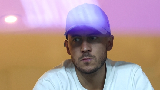 Former Belgian midfielder Eden Hazard watches on from the stands during the Belgian ProLeague football match between RSC Anderlecht and RWD Molenbeek at the Lotto Park Stadium in Brussels on November 26, 2023. (Photo by VIRGINIE LEFOUR / Belga / AFP) / Belgium OUT