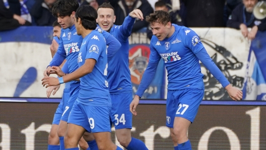 Foto Marco Bucco/LaPresse  22 Gennaio 2024 - Empoli (FI), Italia  Sport, Calcio  Empoli vs Monza - Campionato italiano di calcio Serie A TIM 2023/2024 - Stadio Castellani (FI). Nella foto: Szymon Zurkowski esulta dopo aver segnato il gol del 3-0  Photo Marco Bucco/LaPresse  January 22, 2024 - Empoli (FI), Italy  Sport, Soccer  Empoli vs Monza - Italian Serie A Football Championship 2023/2024 - Castellani Stadium (FI). In the photo: Szymon Zurkowski celebrates after scoring the goal of 3-0