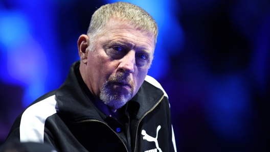 TURIN, ITALY - NOVEMBER 16: Boris Becker, Coach of Holger Rune of Denmark looks on during the Men's Singles Round Robin match between Jannik Sinner of Italy and Holger Rune of Denmark  on day five of the Nitto ATP Finals at Pala Alpitour on November 16, 2023 in Turin, Italy. (Photo by Clive Brunskill/Getty Images)