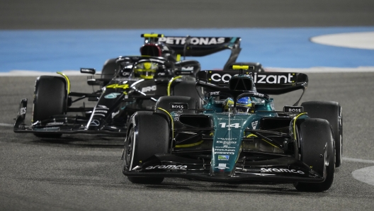 Mercedes driver Lewis Hamilton of Britain and Aston Martin driver Fernando Alonso of Spain, front in action during the Formula One Bahrain Grand Prix at Sakhir circuit, Sunday, March 5, 2023. (AP Photo/Frank Augstein)