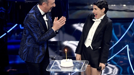 Sanremo Festival host and artistic director Amadeus (L) and Italian singer Giorgia on stage at the Ariston theatre during the 74th Sanremo Italian Song Festival in Sanremo, Italy, 07 February 2024. The music festival runs from 06 to 10 February 2024.   ANSA/RICCARDO ANTIMIANI