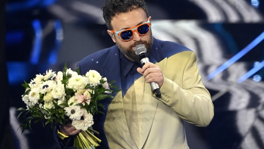 Italian singer Dargen D'Amico performs on stage at the Ariston theatre during the 74th Sanremo Italian Song Festival in Sanremo, Italy, 07 February 2024. The music festival runs from 06 to 10 February 2024.   ANSA/RICCARDO ANTIMIANI