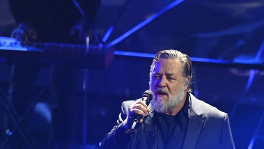 Russell Crowe performs during the 74th edition of the SANREMO Italian Song Festival at the Ariston Theatre in Sanremo, northern Italy - Thursday, FEBRUARY 8, 2024. Entertainment. (Photo by Marco Alpozzi/LaPresse)