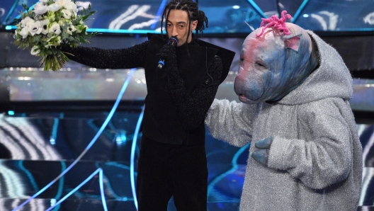 Italian singer Ghali (L) with the puppet Rich Ciolino (R) on stage at the Ariston theatre during the 74th Sanremo Italian Song Festival, Sanremo, Italy, 10 February 2024. The music festival will run from 06 to 10 February 2024.  ANSA/ETTORE FERRARI