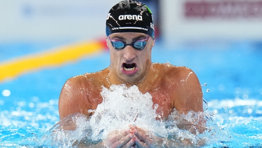 Alberto Razzetti of Italy competes in the men's 200-meter Individual medley heat at the World Aquatics Championships in Doha, Qatar, Wednesday, Feb. 14, 2024. (AP Photo/Hassan Ammar)