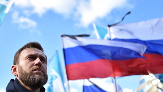 (FILES) Russian opposition leader and anti-corruption blogger Alexei Navalny attends a memorial march marking the one-year anniversary of the assassination of Russian politician Boris Nemtsov in central Moscow, on February 27, 2016. Nemtsov, a former deputy prime minister in the government of Boris Yeltsin, was gunned down shortly before midnight on February 27, 2015, while walking across a bridge a short distance from the Kremlin with his Ukrainian model girlfriend. AFP PHOTO / KIRILL KUDRYAVTSEV. Russian opposition leader Alexei Navalny died on February 16, 2024 at the Arctic prison colony where he was serving a 19-year-term, Russia's federal penitentiary service said in a statement. (Photo by Kirill KUDRYAVTSEV / AFP)