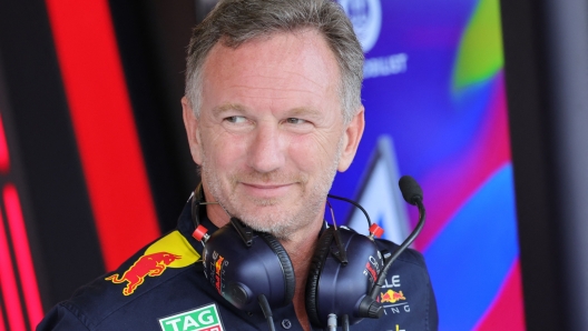 (FILES) Red Bull Racing's British team principal Christian Horner looks on during the third practice session for the Abu Dhabi Formula One Grand Prix at the Yas Marina Circuit in the Emirati city on November 25, 2023. Oracle Red Bull Racing, Thursday February 15, will launch the Team's 20th Season in Formula One, with a live streamed show from Milton Keynes, featuring CEO and Team Principal Christian Horner, Max Verstappen, Sergio Perez and F1 Academy drivers Emely de Heus and Hamda Al Qubaisi. (Photo by Giuseppe CACACE / AFP)