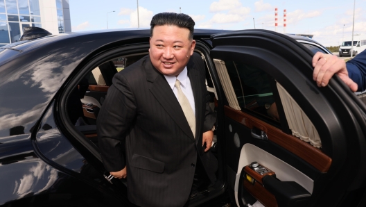 epa10857970 North Korean leader Kim Jong Un leaves a car as he visits the Vostochny cosmodrome outside of the town of Tsiolkovsky (former Uglegorsk), some 180 km north of Blagoveschensk in Amur region, Russia, 13 September 2023.  EPA/MIKHAIL METZEL/SPUTNIK/KREMLIN POOL MANDATORY CREDIT