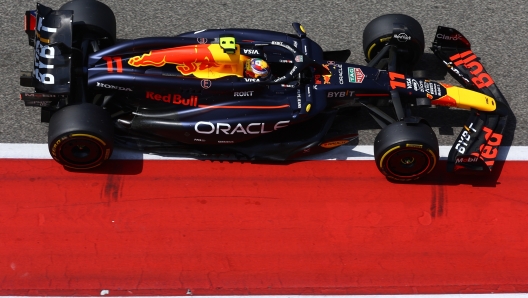 BAHRAIN, BAHRAIN - FEBRUARY 23: Sergio Perez of Mexico driving the (11) Oracle Red Bull Racing RB20 on track during day three of F1 Testing at Bahrain International Circuit on February 23, 2024 in Bahrain, Bahrain. (Photo by Mark Thompson/Getty Images)