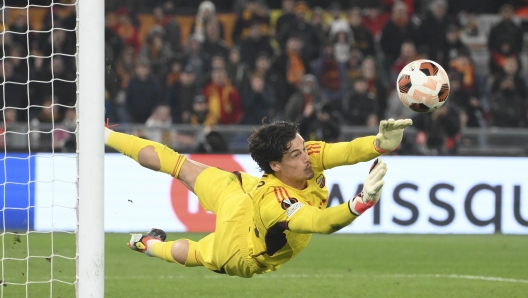 ROME, ITALY - FEBRUARY 22: AS Roma player Mile Svilar saves a penalty during the shootout of the UEFA Europa League 2023/24 knockout round play-offs second leg match between AS Roma and Feyenoord at Stadio Olimpico on February 22, 2024 in Rome, Italy. (Photo by Luciano Rossi/AS Roma via Getty Images)