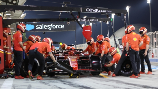 epa11175416 Ferrari mechanics work on Monaco's Formula One driver Charles Leclerc's car during the pre-season testing for the 2024 Formula One season at the Bahrain International Circuit in Sakhir, Bahrain, 23 February 2024.  EPA/ALI HAIDER