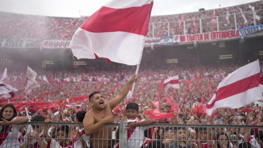 River Plate's fans wait for the start of an Argentine soccer league match against Boca Juniors in Buenos Aires, Argentina, Sunday, Feb. 25, 2024. (AP Photo/Natacha Pisarenko)