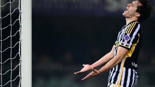 Juventus' Italian forward #7 Federico Chiesa reacts during the Italian Serie A football match between Hellas Verona and Juventus at the Marcantonio Bentegodi stadium in Verona on February 17, 2024. (Photo by MARCO BERTORELLO / AFP)