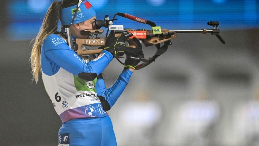 Italy's Lisa Vittozzi competes during the single mixed relay event of the IBU Biathlon World Championships in Nove Mesto, Czech Republic on February 15, 2024. (Photo by Joe Klamar / AFP)