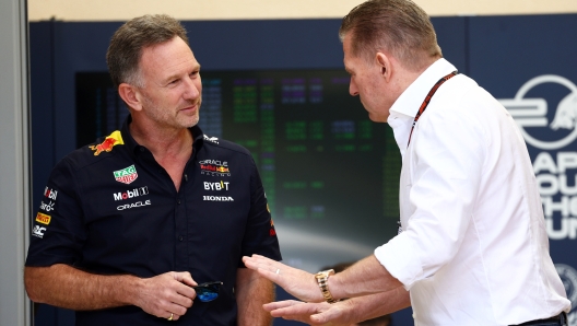 BAHRAIN, BAHRAIN - FEBRUARY 29: Oracle Red Bull Racing Team Principal Christian Horner talks with Jos Verstappen in the Paddock prior to practice ahead of the F1 Grand Prix of Bahrain at Bahrain International Circuit on February 29, 2024 in Bahrain, Bahrain. (Photo by Clive Rose/Getty Images)